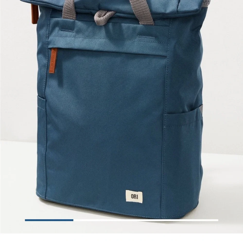 Modern Blue Backpack with Durable Fabric and Minimalist Design - Picture 1 of 6